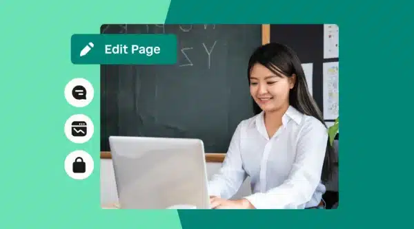 Teacher sitting at laptop editing school website with SchoolStatus Sites.