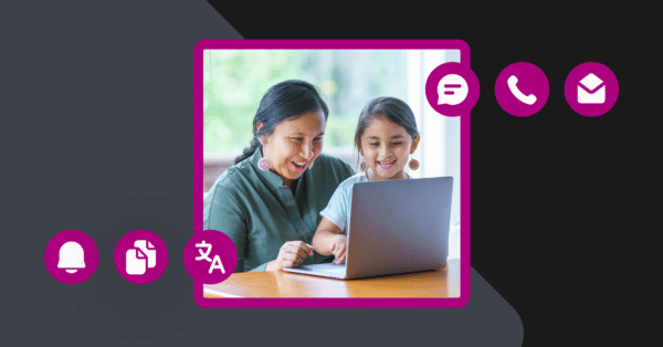 mother and daughter read a school newsletter on a laptop