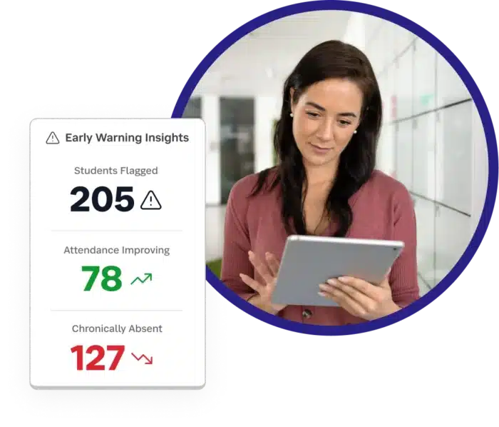 school administrator looking at attendance data on tablet