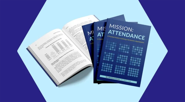 A Kindle showing the cover page of the Mission: Attendance book with a book open showing page in Chapter 1.