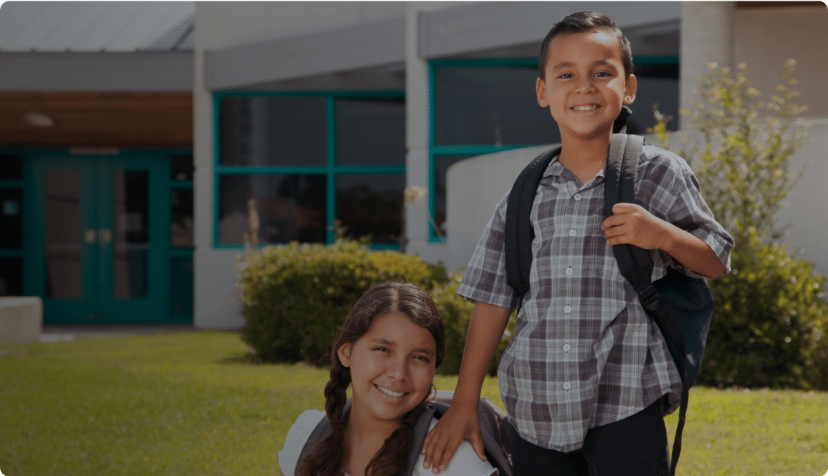 Two kids with their backpacks